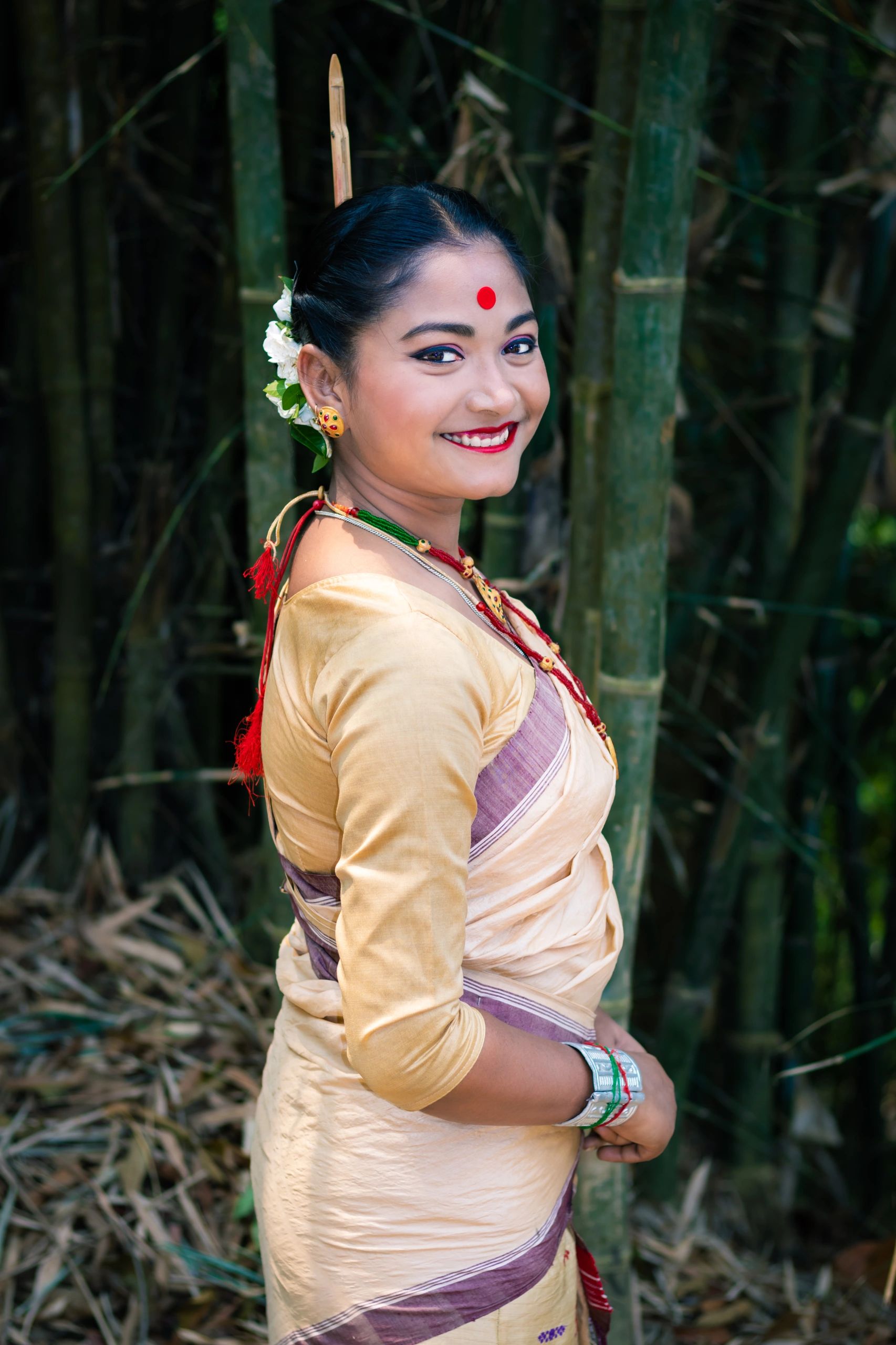 Assam bridal look in traditional festival attire