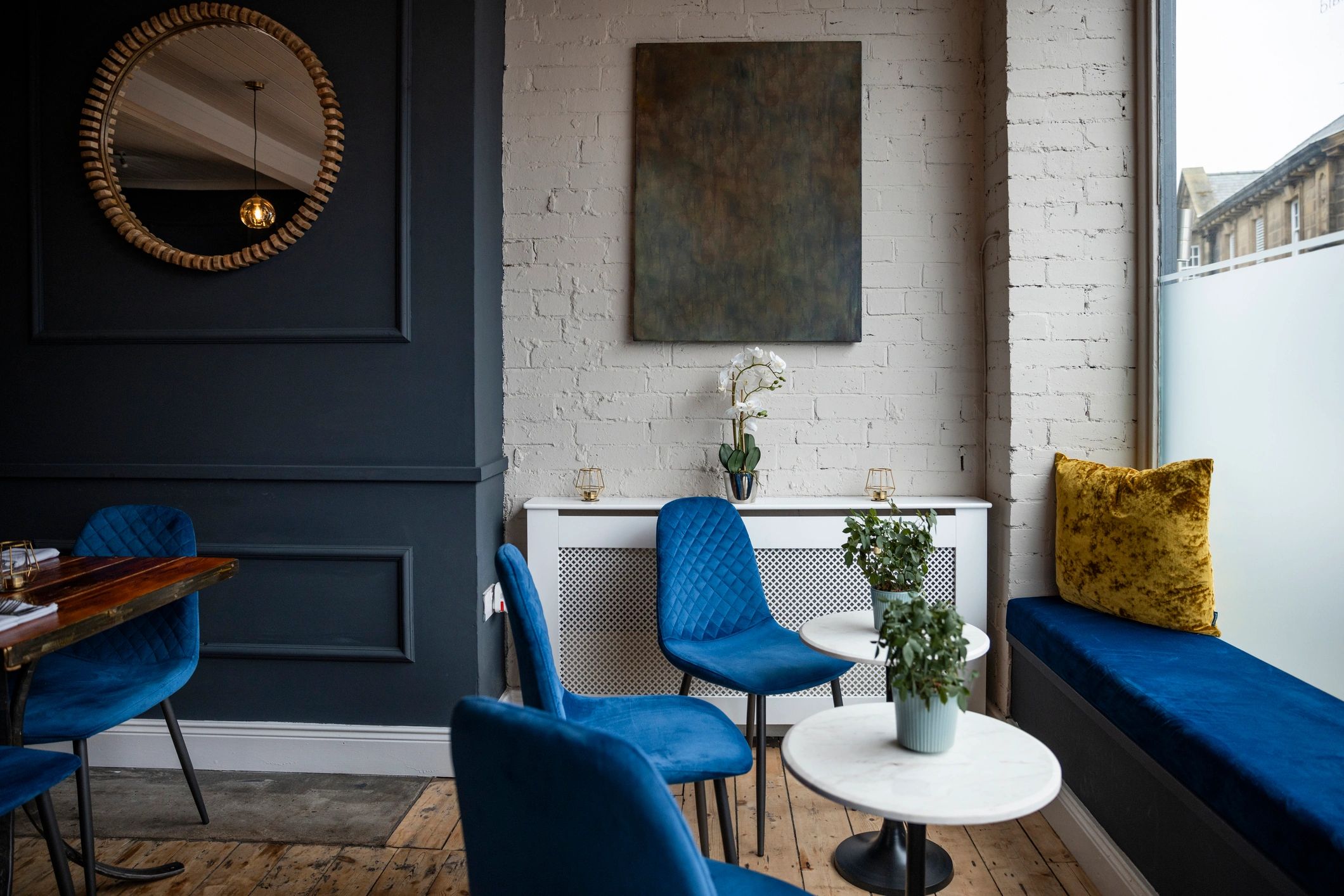 Modern editorial interior with set tables
