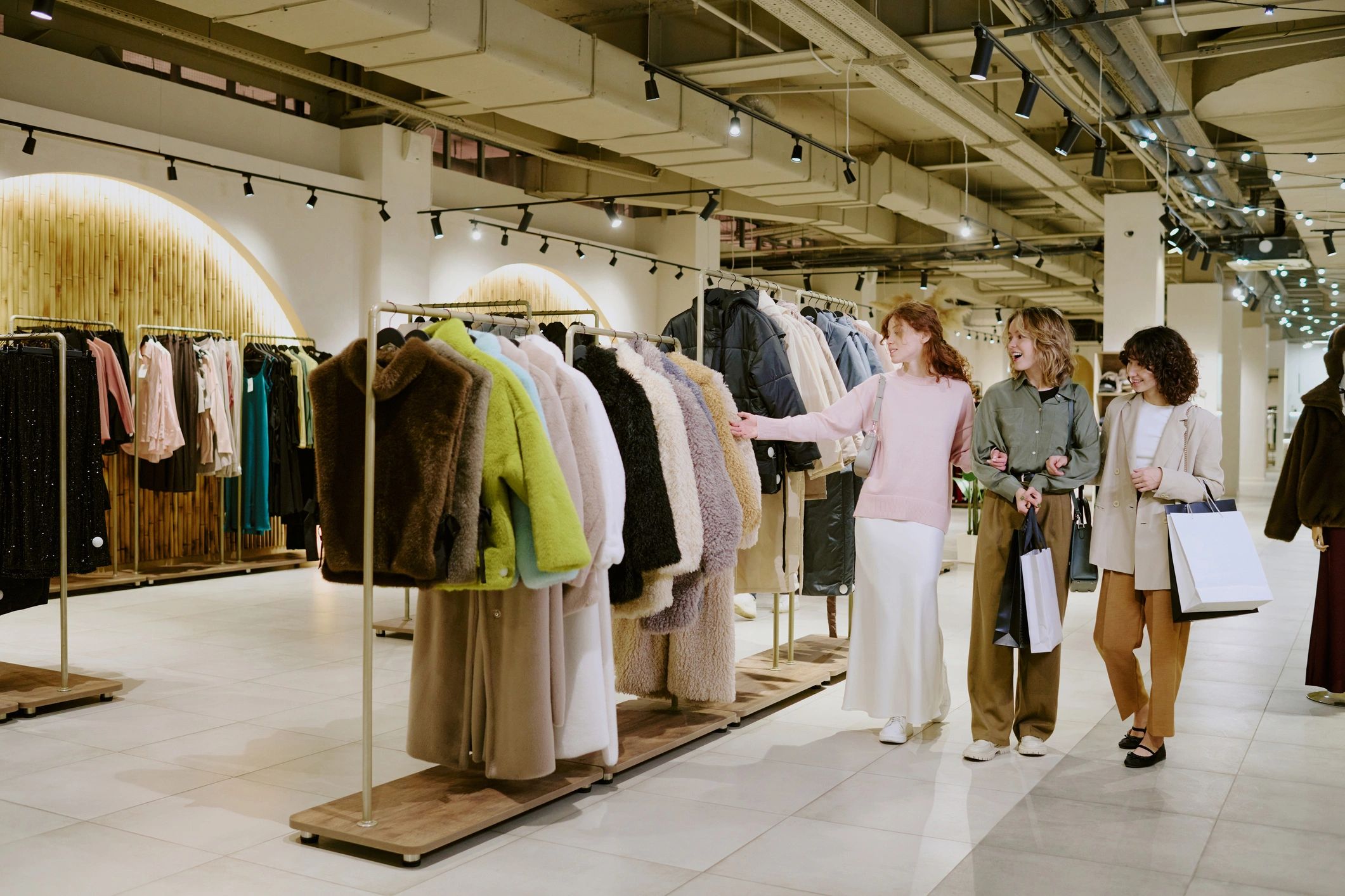 Shoppers exploring a new fashion collection