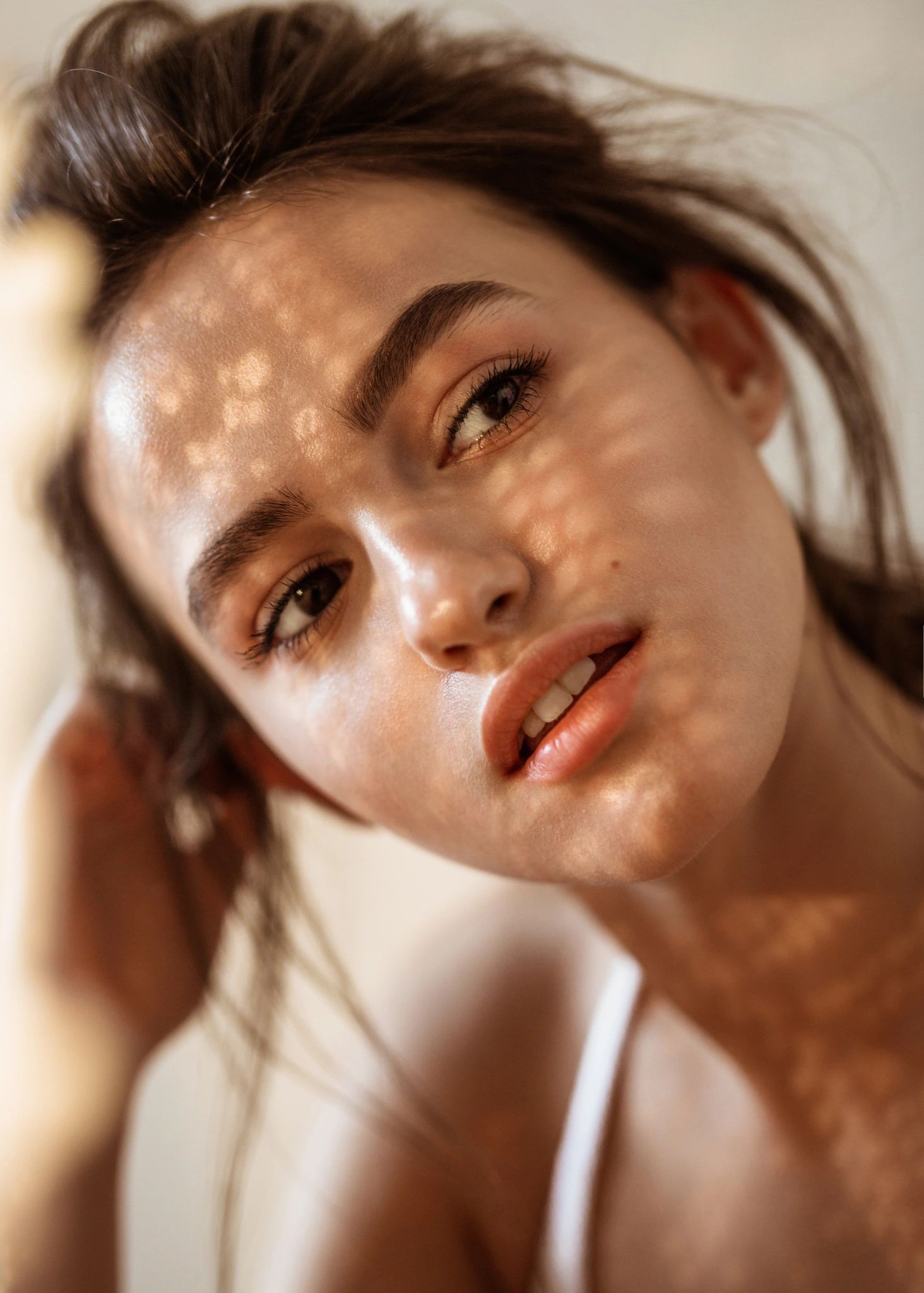 Portrait with dramatic shadow across the face